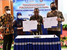 Sukseskan Bulan Imunisasi, UNICEF Gandeng UHO Penandatangan Memorandum Of Understanding (MoU) antara UHO dengan perwakilan dari UNICEF Indonesia. (FOTO ISTIMEWA)